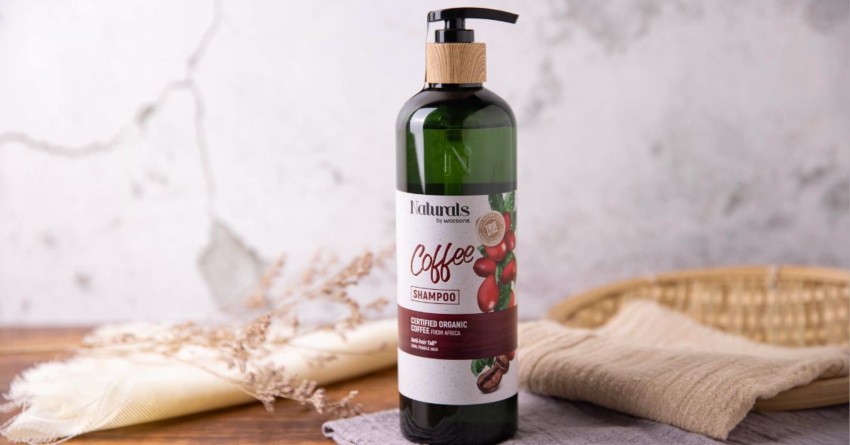 Close-up of a bottle of sulfate‑free shampoo with a list of natural ingredients